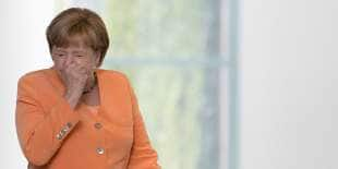 angela merkel starnutisce 3