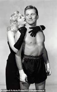 kirk douglas con marilyn maxwell in il grande campione 1949